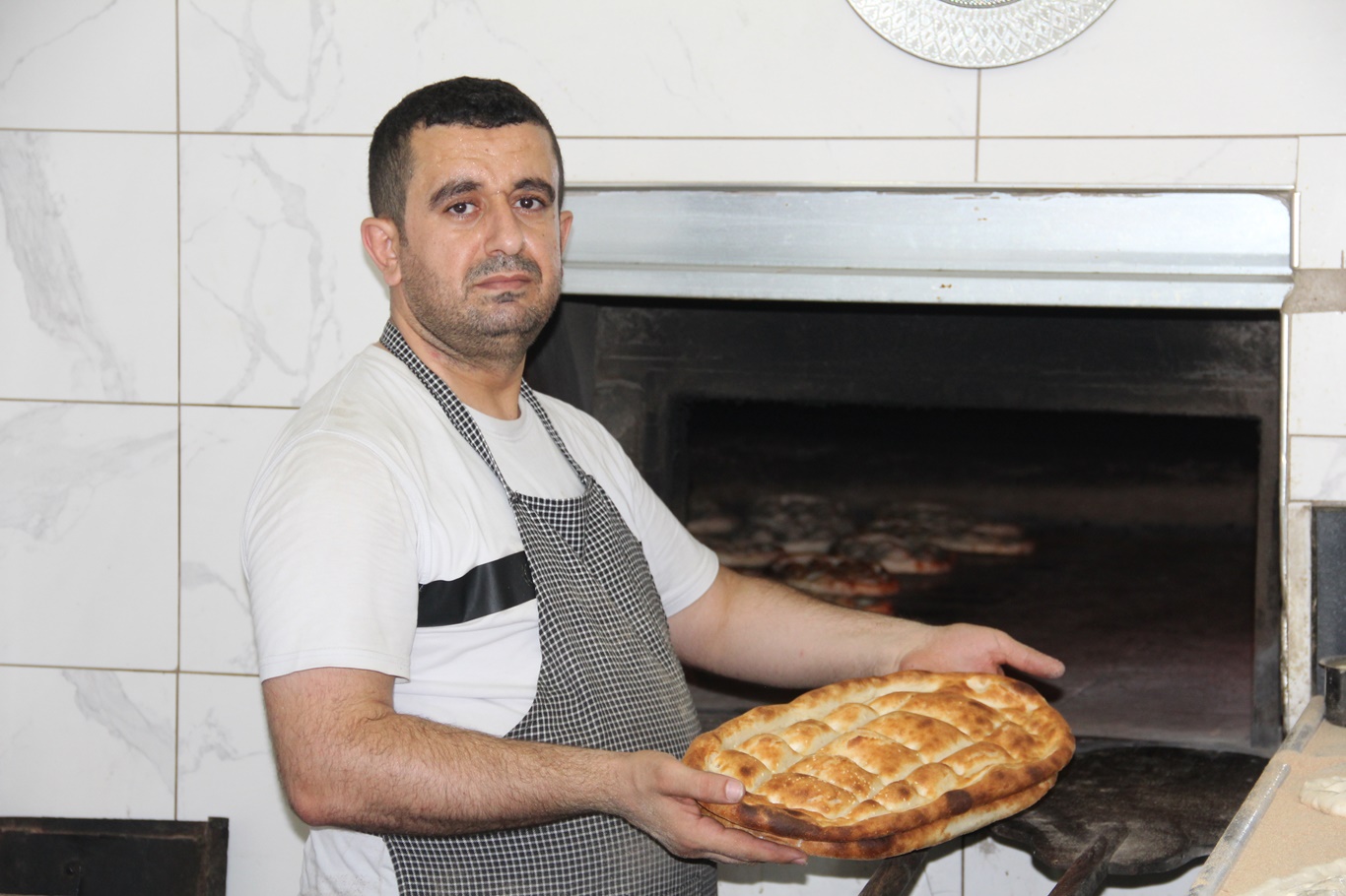 100 Derecelik sıcakta ekmek mücadelesi