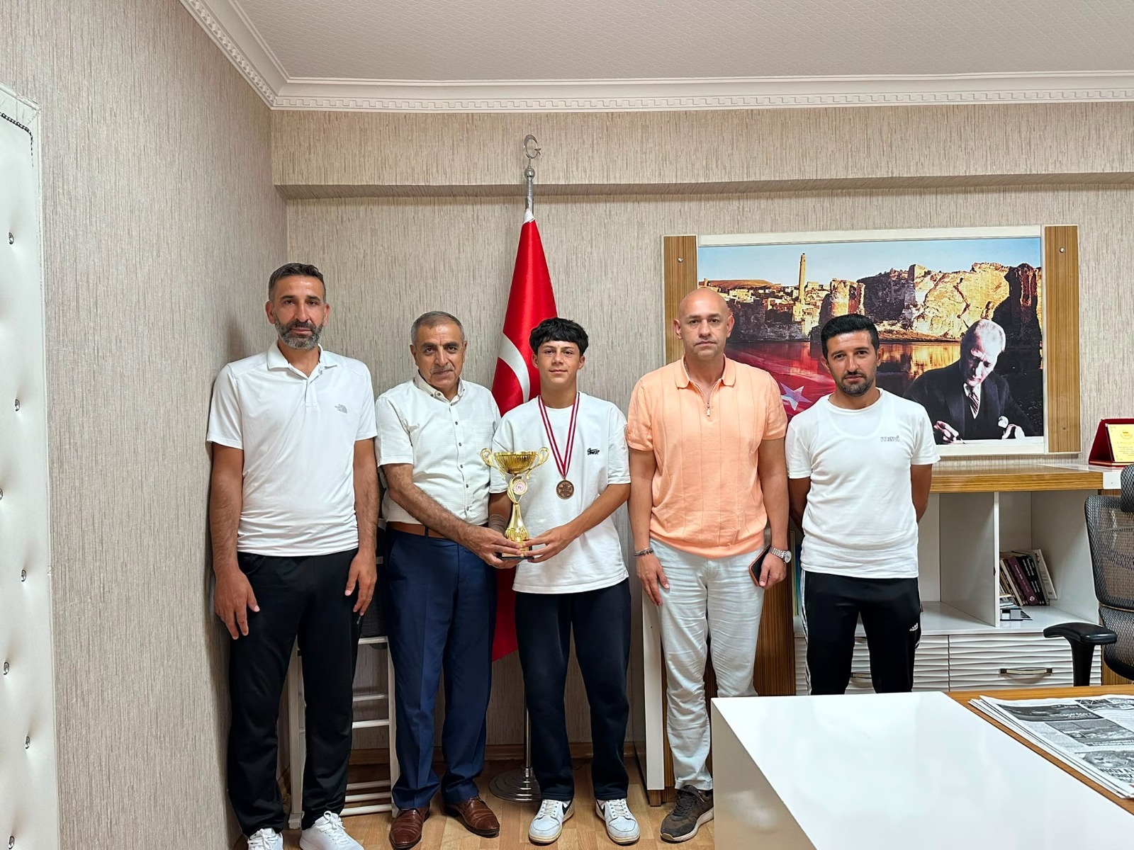 Milli atletten çifte başarı